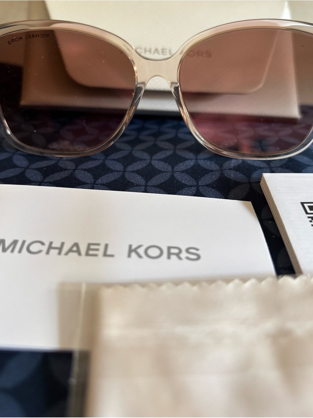 Michael Kors Blush Transparent Frame Sunglasses with Pink-Tinted Lenses